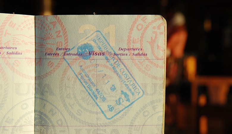 Close-up view of a Costa Rican visa stamp on a passport page, representing the Residency Requirements in Costa Rica.