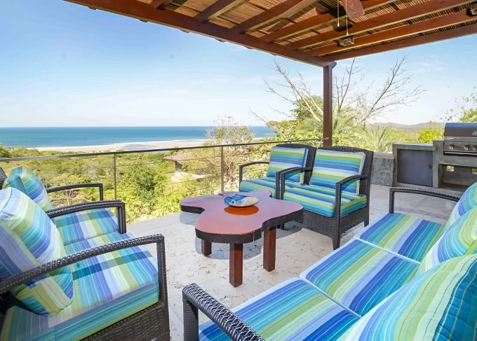 Comfortable outdoor seating area with ocean view highlighting commercial real estate market trends